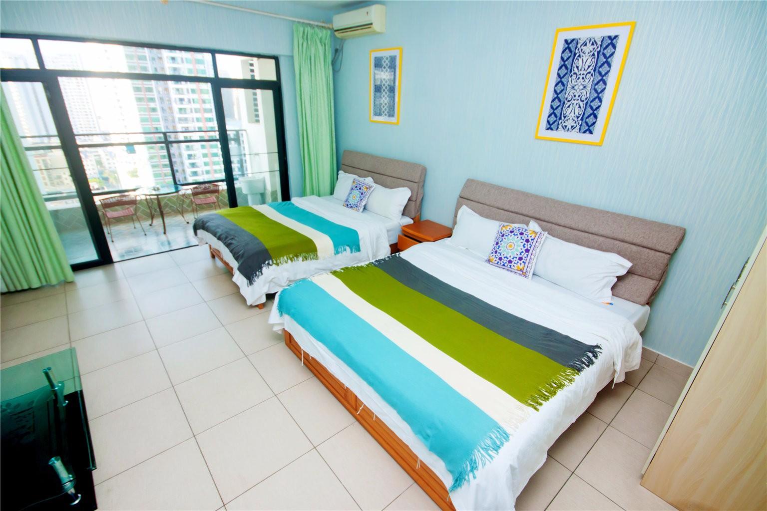 三亚湾海月广场椰梦长廊金凤凰高级海景双床房（送游艇潜水）